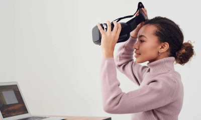 woman holding black vr headset 3183176