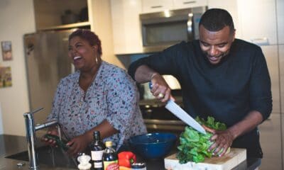 man slicing vegetable