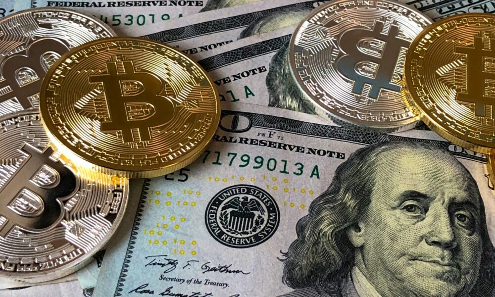 Bitcoins and U.s Dollar Bills