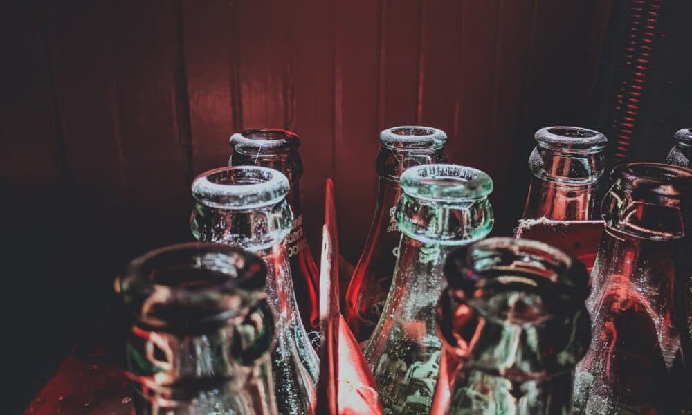 selective color photography of glass bottles