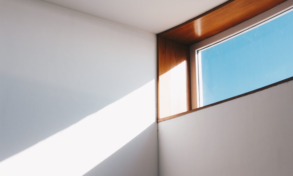 Clear Glass Window With Brown and White Wooden Frame