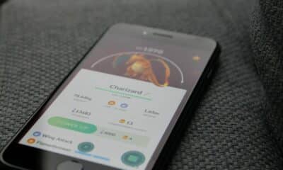 Turned-on Iphone Displaying Pokemon Go Charizard Application
