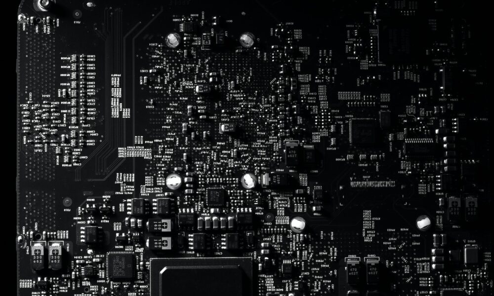 Black and White Photography of a Mother Board