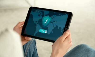 Person Holding A Tablet