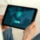 Person Holding A Tablet