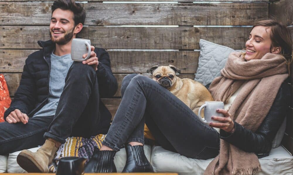 man, woman, dog