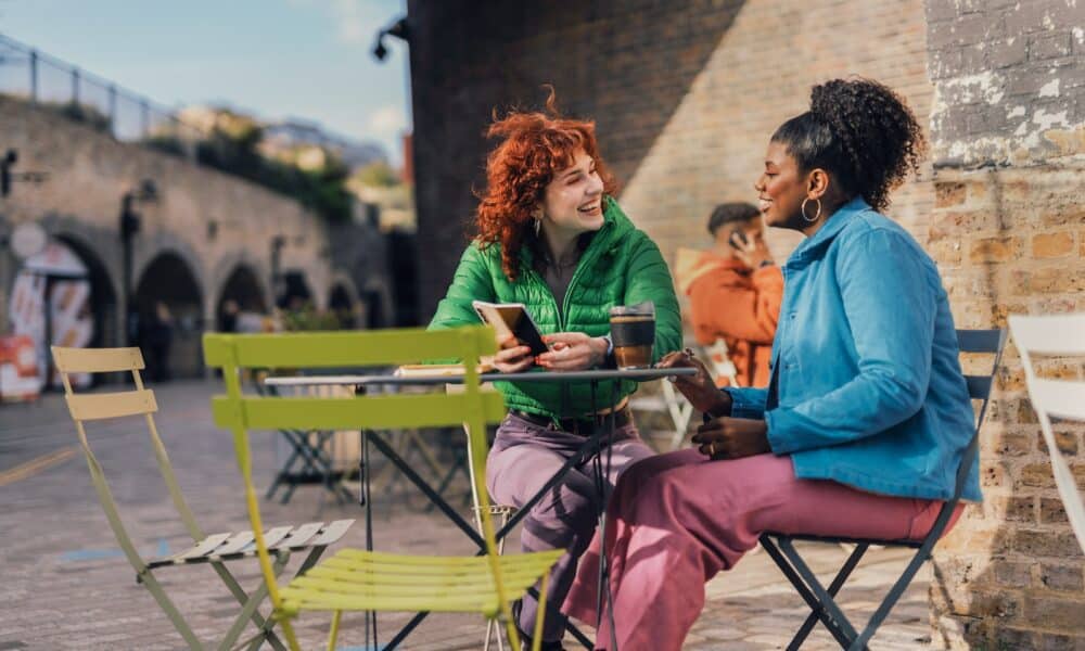 a few women sitting at a table