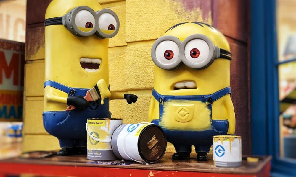two Minions character figure on red table