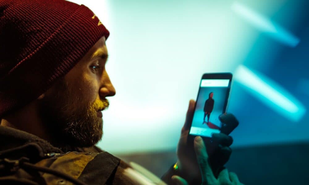 man using smartphone