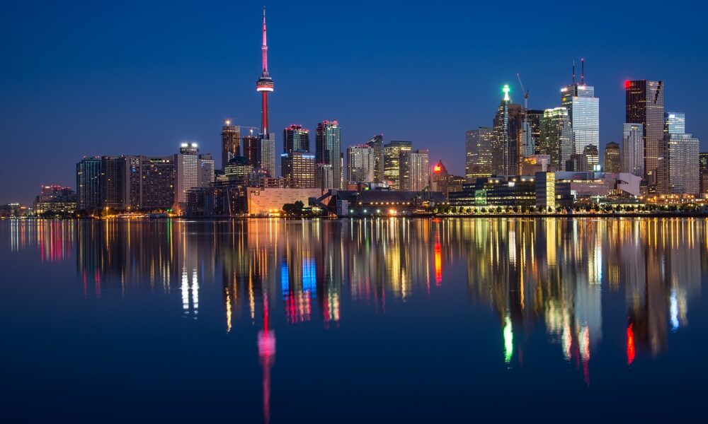 buildings, cn tower, river