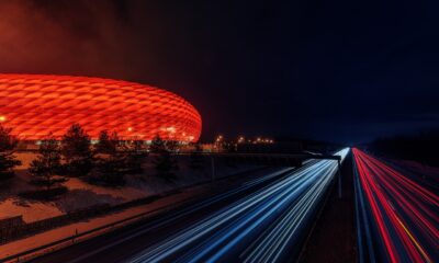 football stadium, highway, night