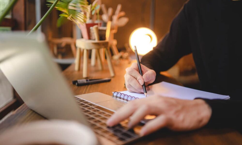 people hand holding a pen for working to write on 2022 12 16 03 01 21 utc