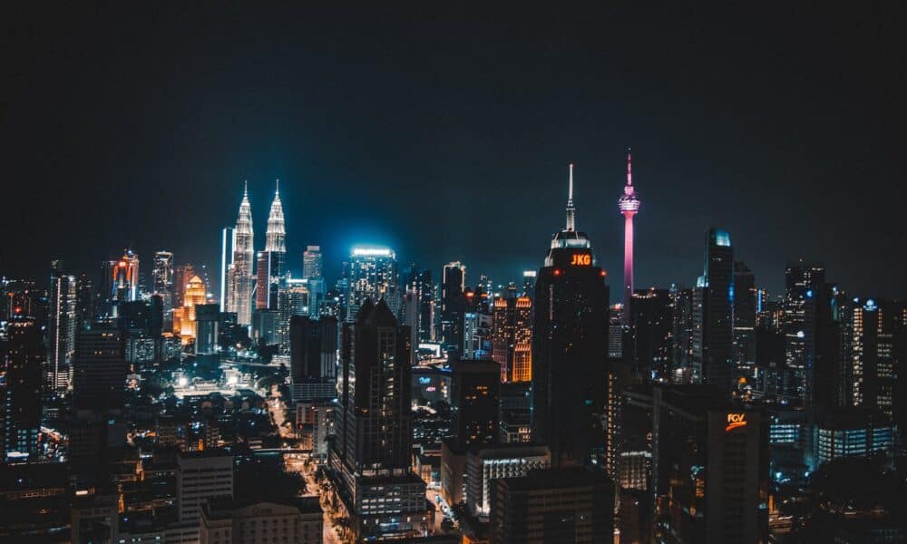 Photo of High Rise Buildings at Nighttime