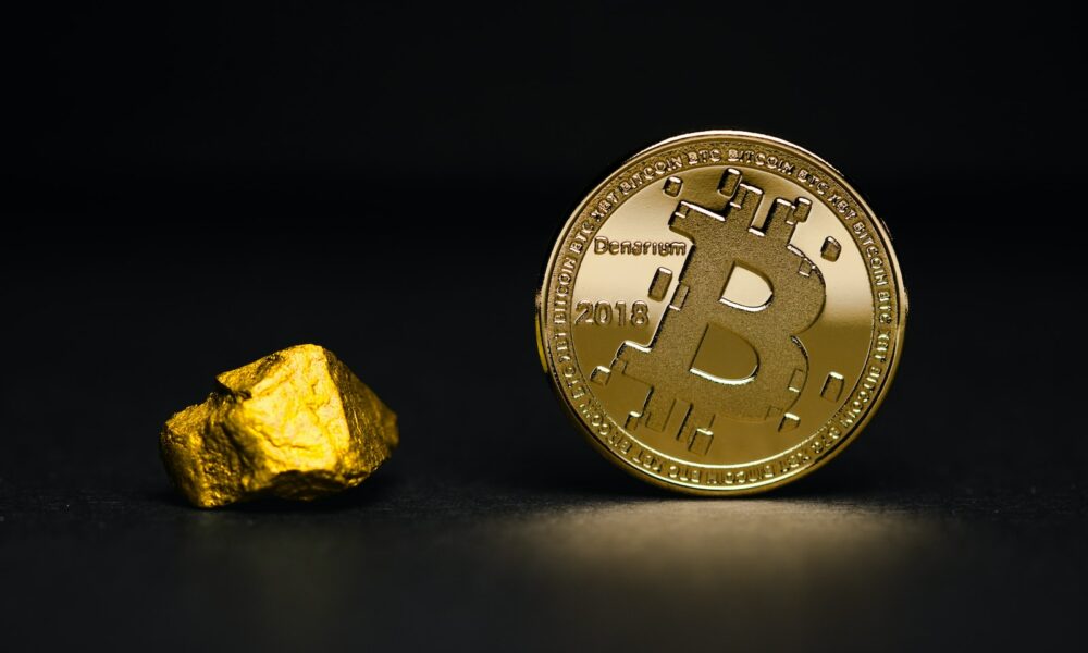 round gold-colored bit coin