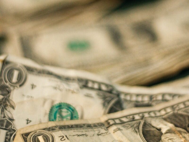 shallow focus photography of U.S. dollar banknotes