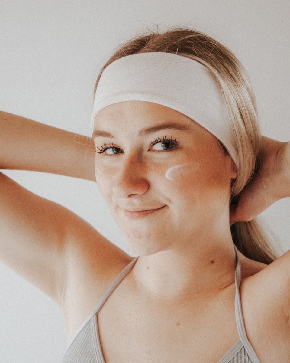 OKDERMO: Elevating Your Skincare Experience with Trust and Quality 16 woman in white tank top