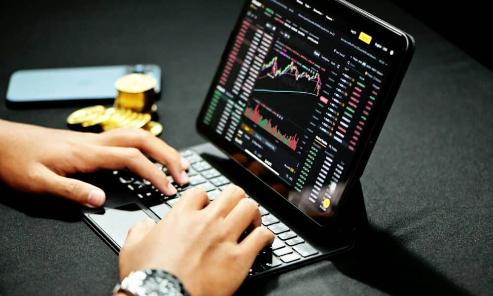 person using black laptop computer