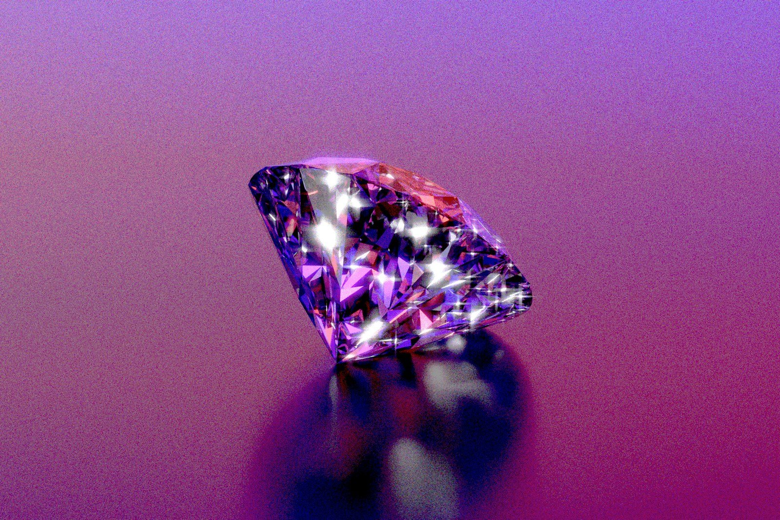 Why Pink Diamonds Defy Gemological Rules 16 A sparkly diamond shines on a purple background.