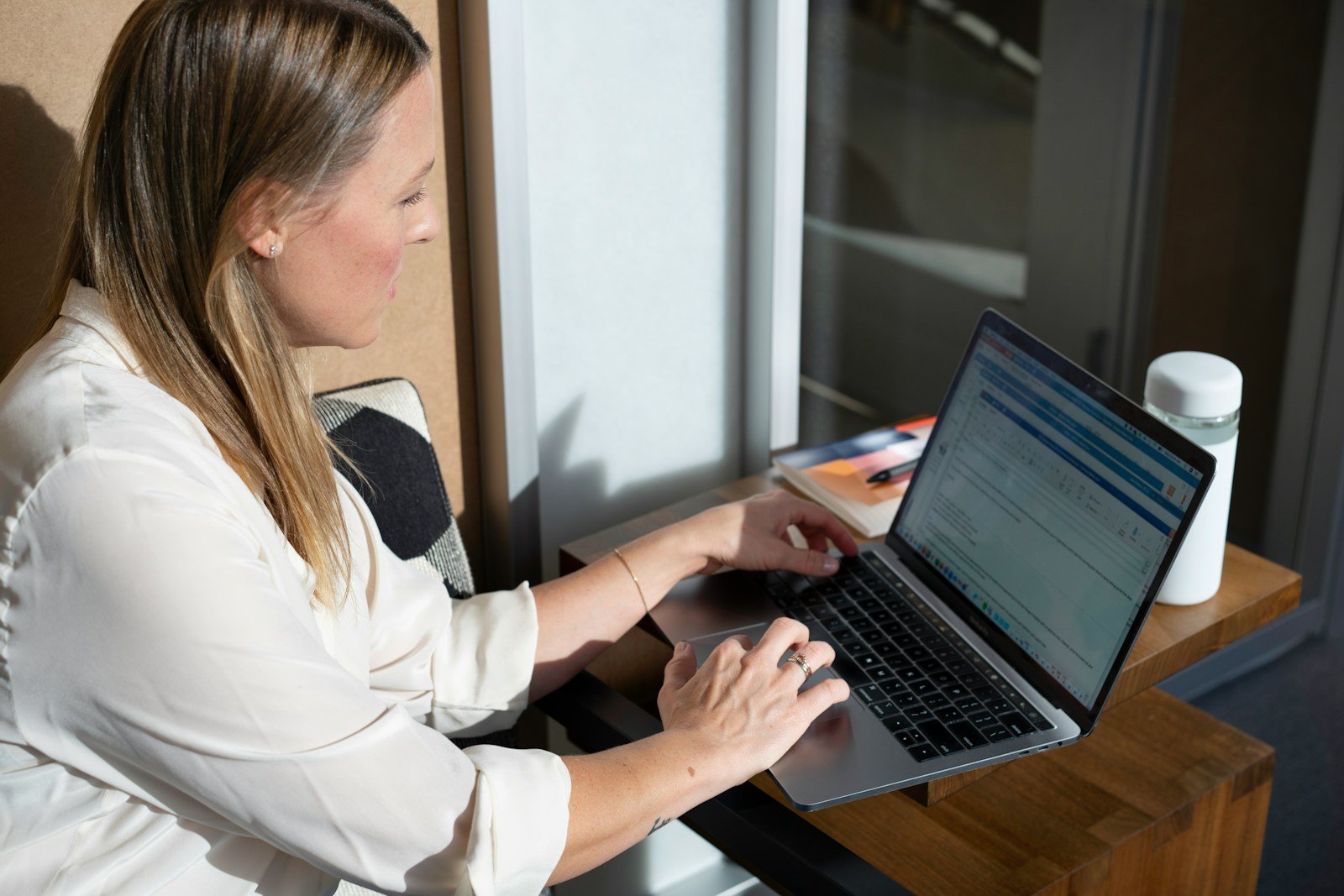 Top 5 Virtual Bookkeeping Services for Growing Businesses 16 woman in white long sleeve shirt using black laptop computer