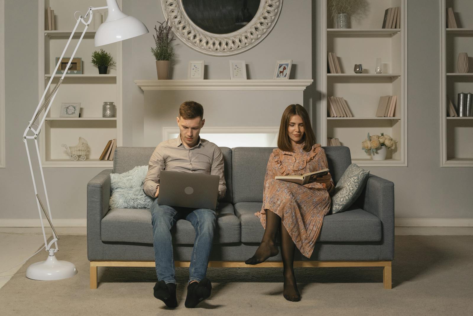 Techgup org: Reliable Tech News, Reviews & How-To Guides 16 A couple relaxing in a modern living room, reading and using a laptop on the couch.
