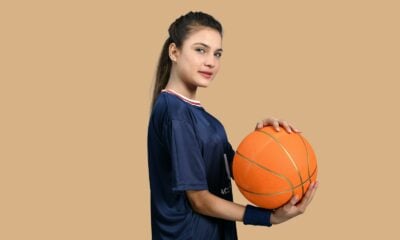 a man holding a basketball
