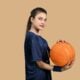 a man holding a basketball
