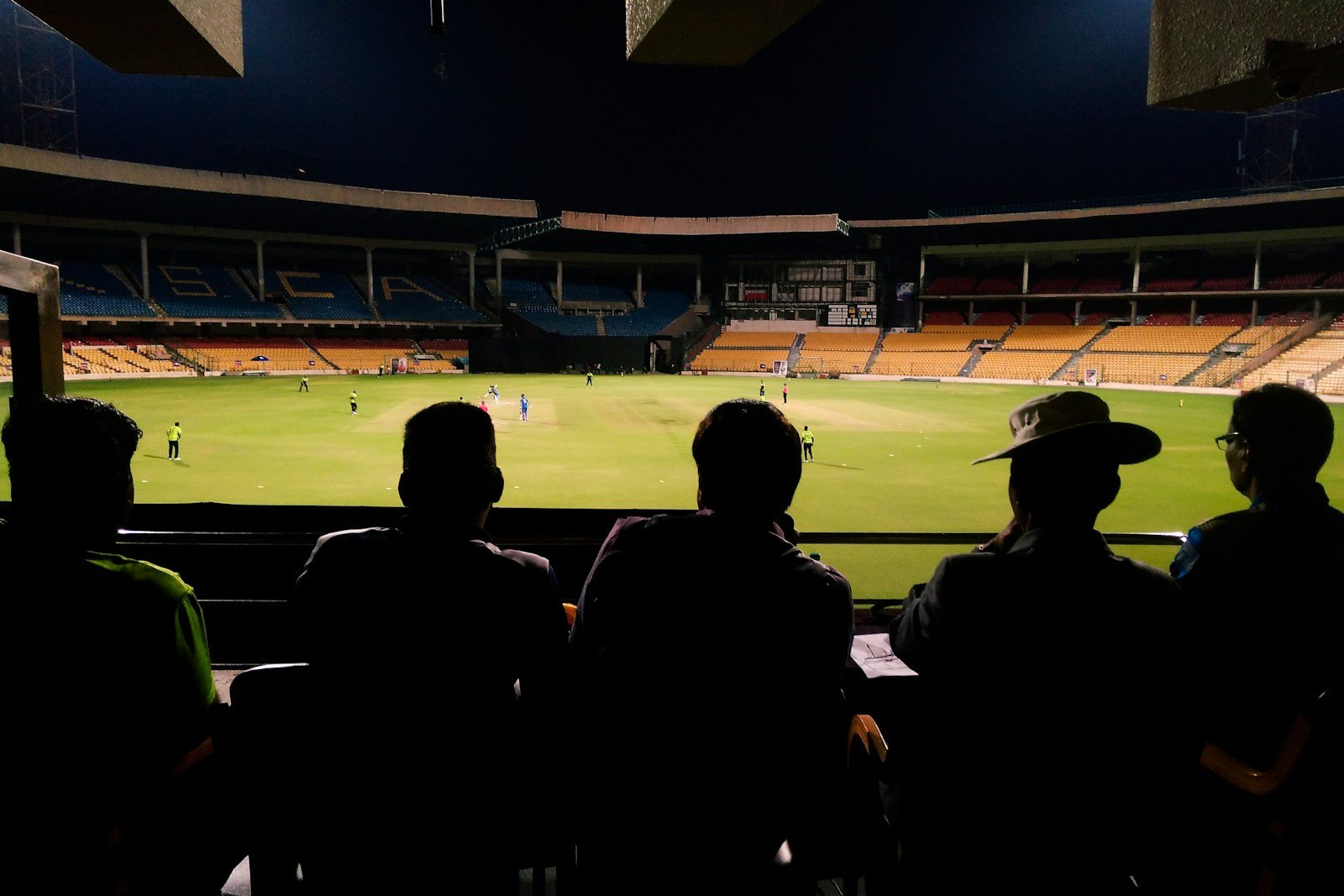 Zimbabwe vs New Zealand: A Cricketing Rivalry Revisited 17 people watching soccer game during nighttime