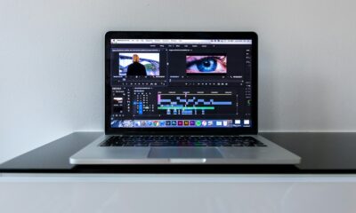 MacBook Pro on black desk