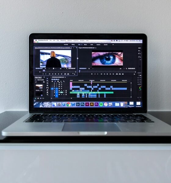 MacBook Pro on black desk