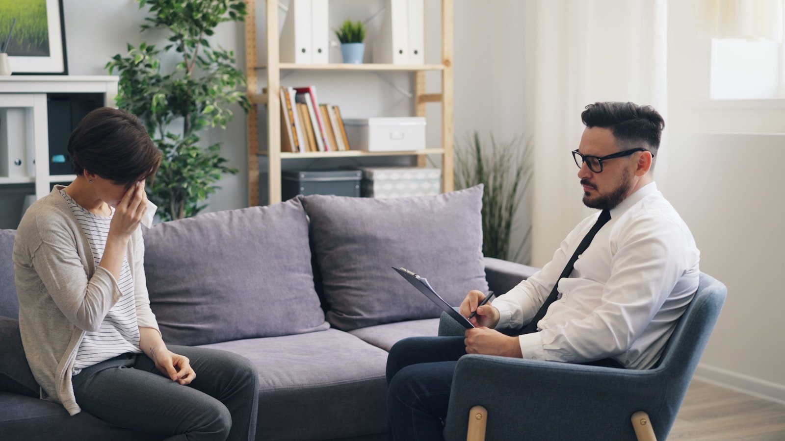Mastering Excel Interview Questions: The Ultimate Guide to Land Your Dream Job 16 a man and a woman sitting on a couch