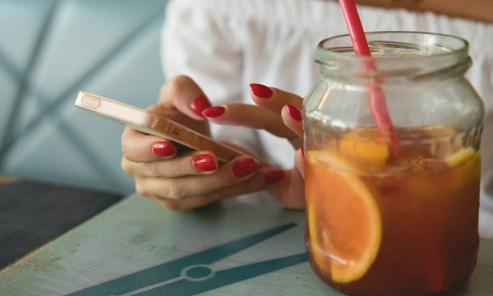clear glass jar filled with fruit juice