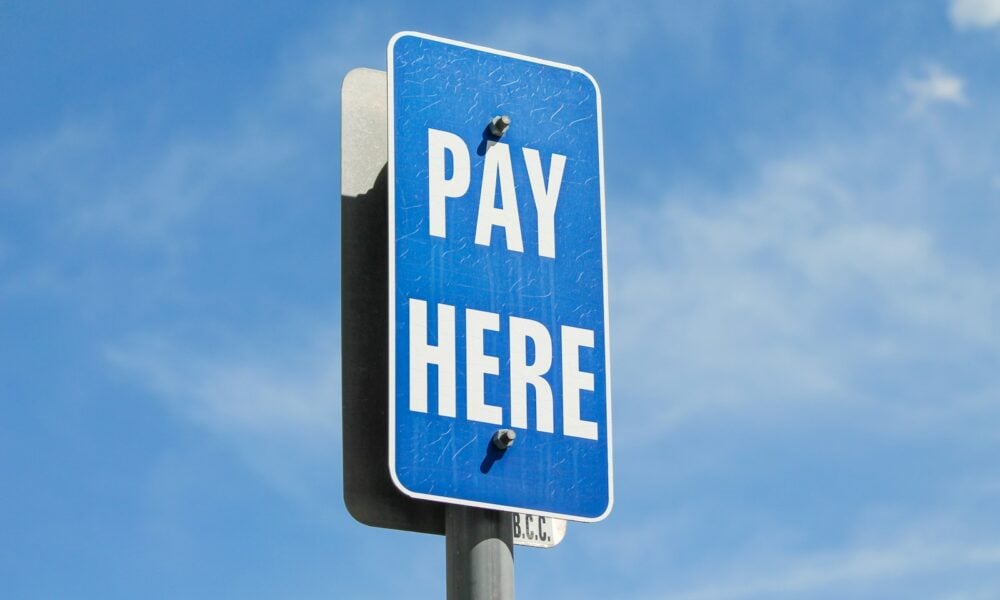 a blue sign with white text