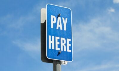 a blue sign with white text