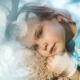 girl in white and blue floral dress lying on white fur textile