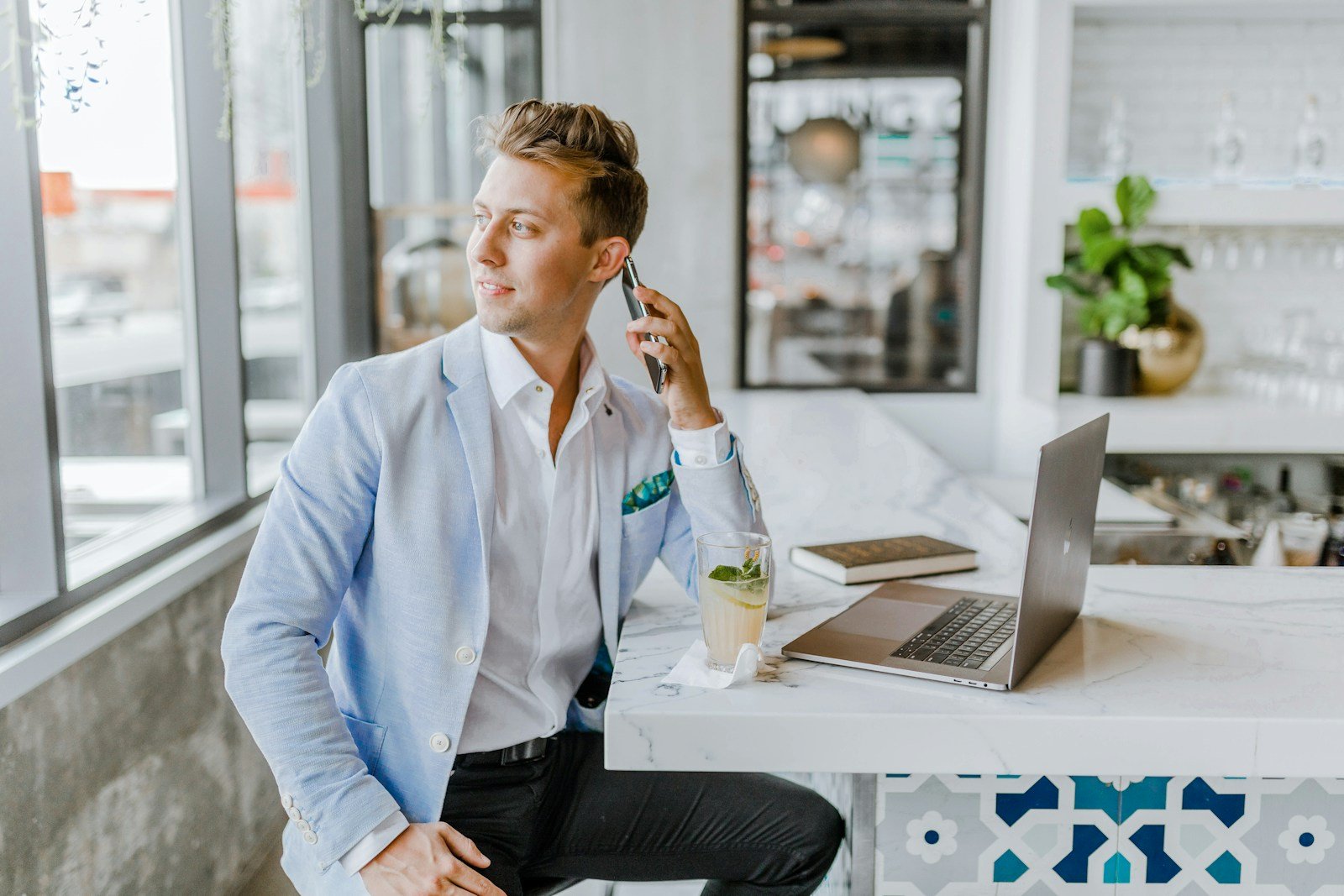 Outbound Sales Optimization: Proven Strategies for Scalable Growth 16 man sitting beside white wooden table