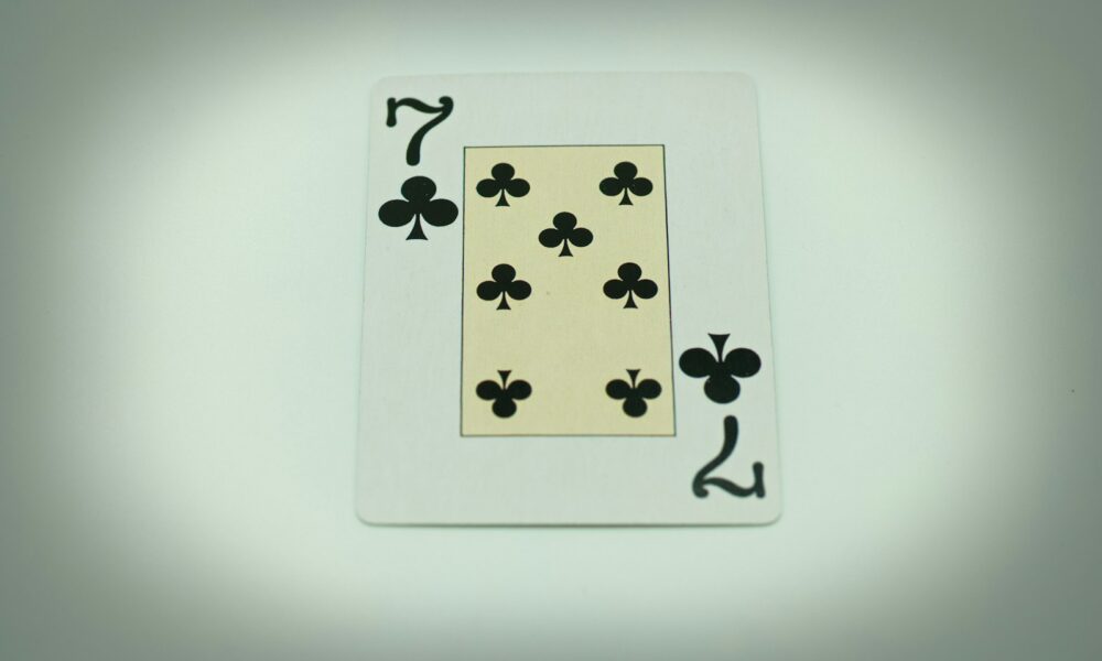 a playing card with four of spades on it