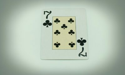 a playing card with four of spades on it