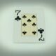 a playing card with four of spades on it