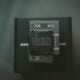 closeup photo of square black cordless device