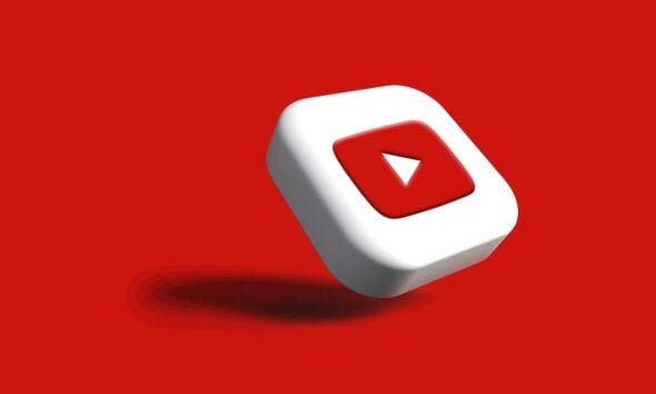 a white cube with a red arrow on a red background
