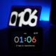 black digital clock at 1:06