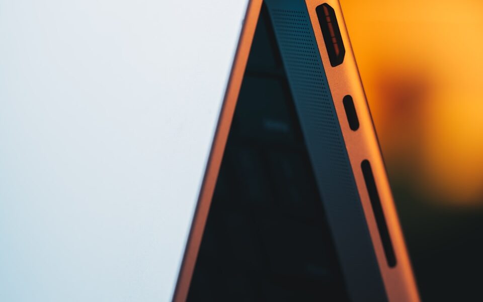 a close up of a laptop computer with a blurry background