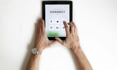 person using black iPad