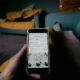 person holding white iphone 5 c