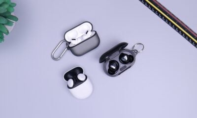 black and white headphones on white table
