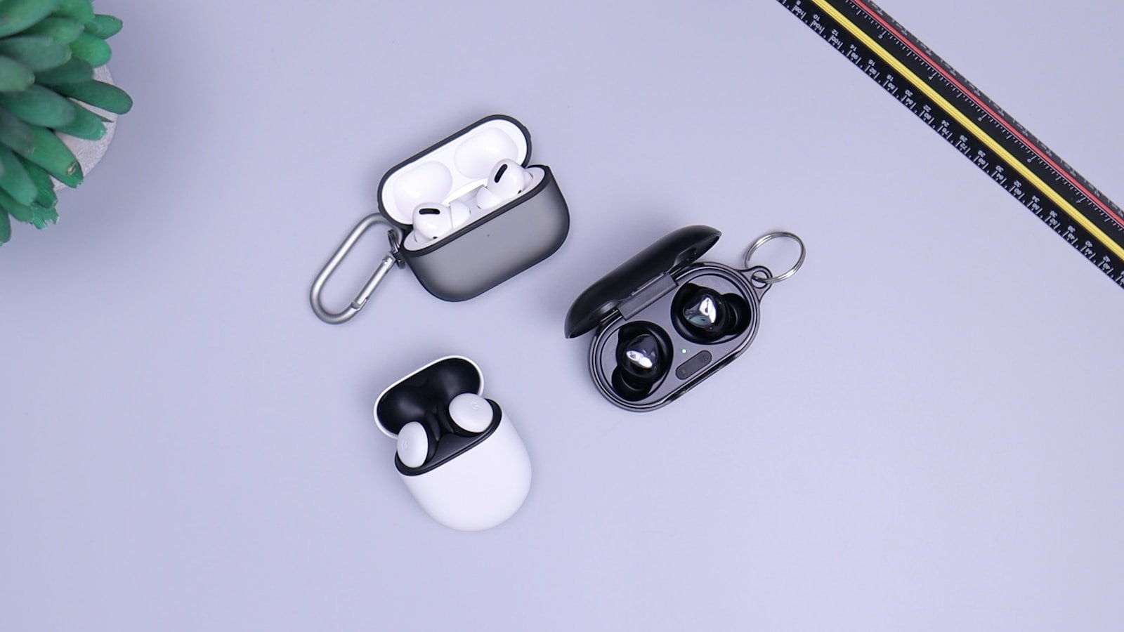 Perfect Fit: Best Earbuds for Small Ears 16 black and white headphones on white table