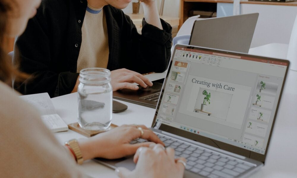 woman using Surface laptop