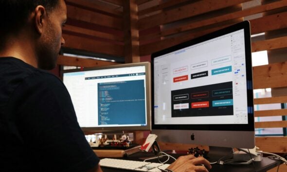 man using Apple computer