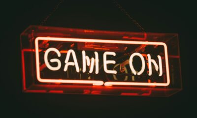 red and white Game On LED signage