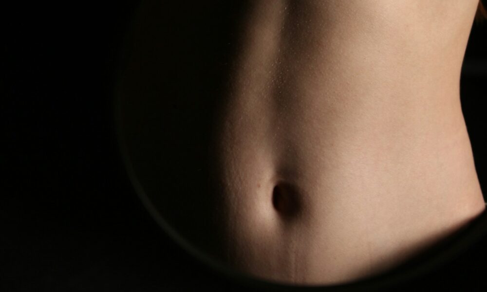 A close-up of a person's abdomen.